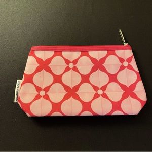Clinique cosmetic case designed by Jonathan Adler in shades of pink.
